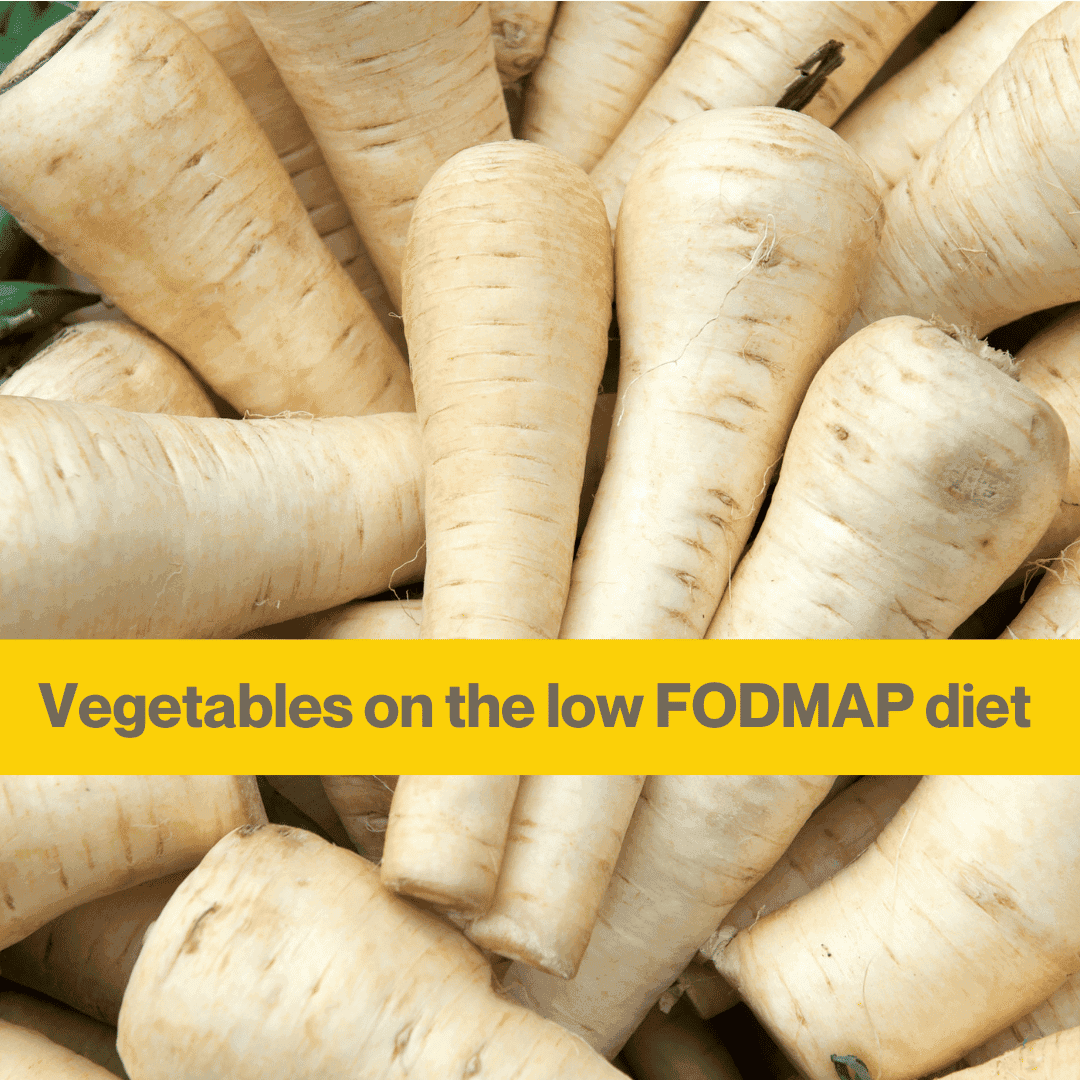 Close up of raw whole parsnips in a pile