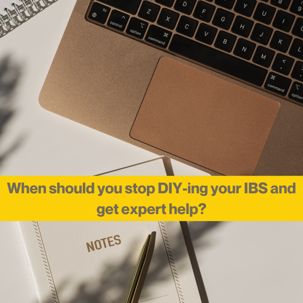 Flat lay laptop and white notebook with the words When should you stop DIYing your IBS and get expert help